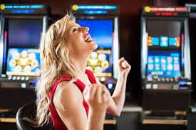 Baccarat dealer and player view on mobile phone with touch betting controls